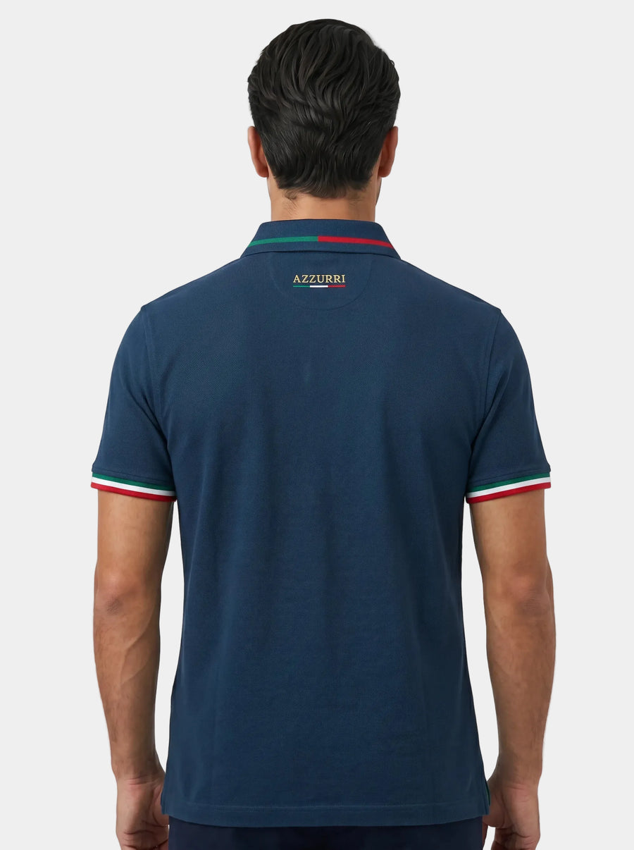 Man wearing a navy blue polo shirt with 'Azzurri' branding on the back against a white background