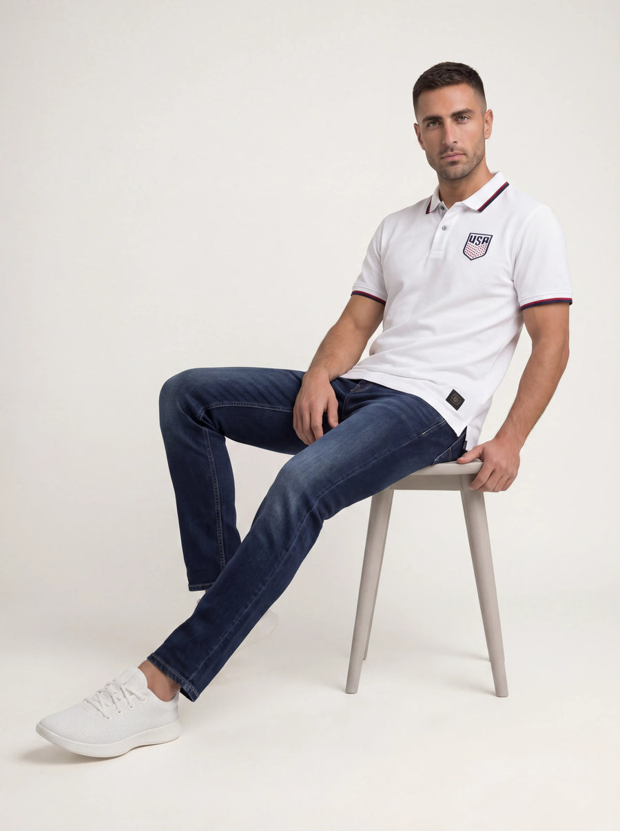 USA USMNT White Polo Shirt — relaxed seated lifestyle view