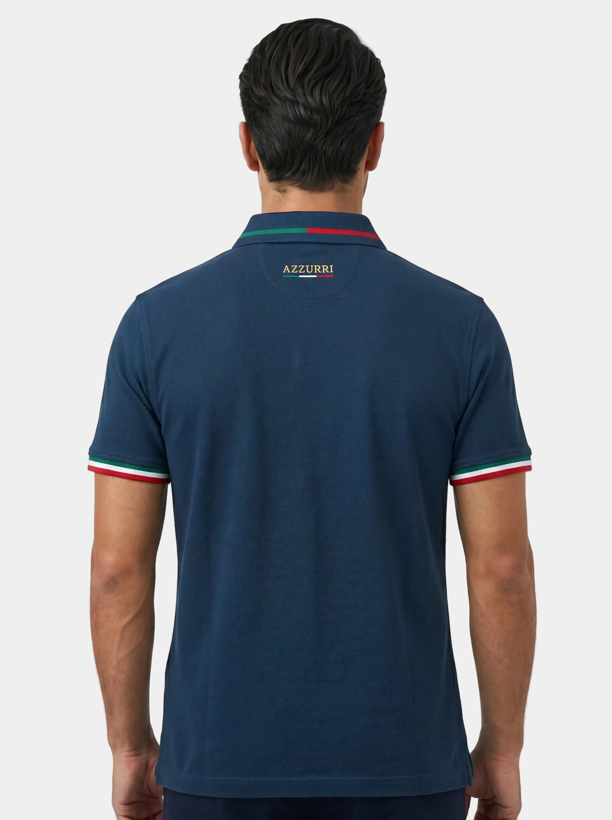 Man wearing a navy blue polo shirt with 'Azzurri' branding on the back against a white background