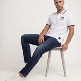 USA USMNT White Polo Shirt — relaxed seated lifestyle view